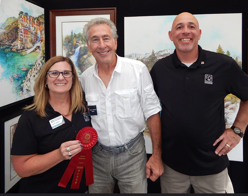 Bruce White receiving art award for watercolor paintings